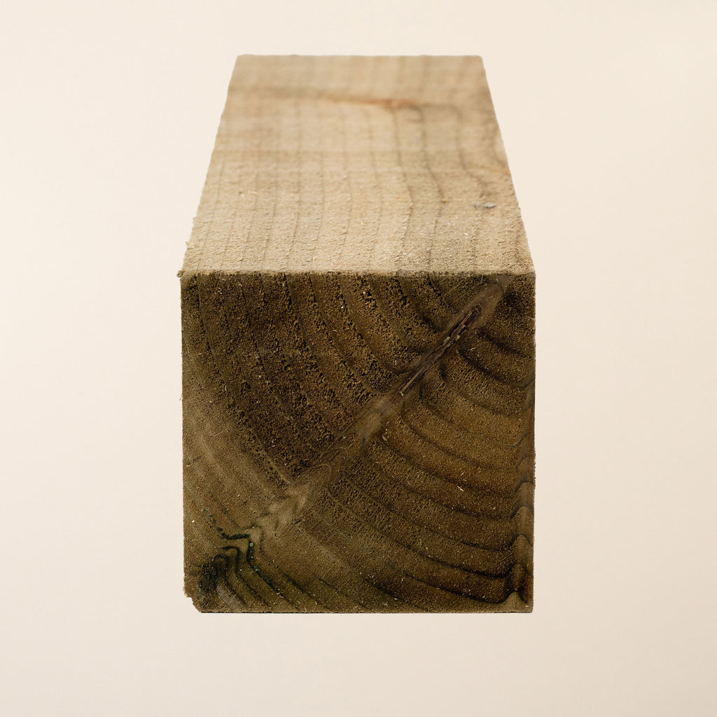 3.6m treated timber post with 100mm x 100mm square profile showing full length view with green pressure treatment and rough sawn texture for maximum durability 