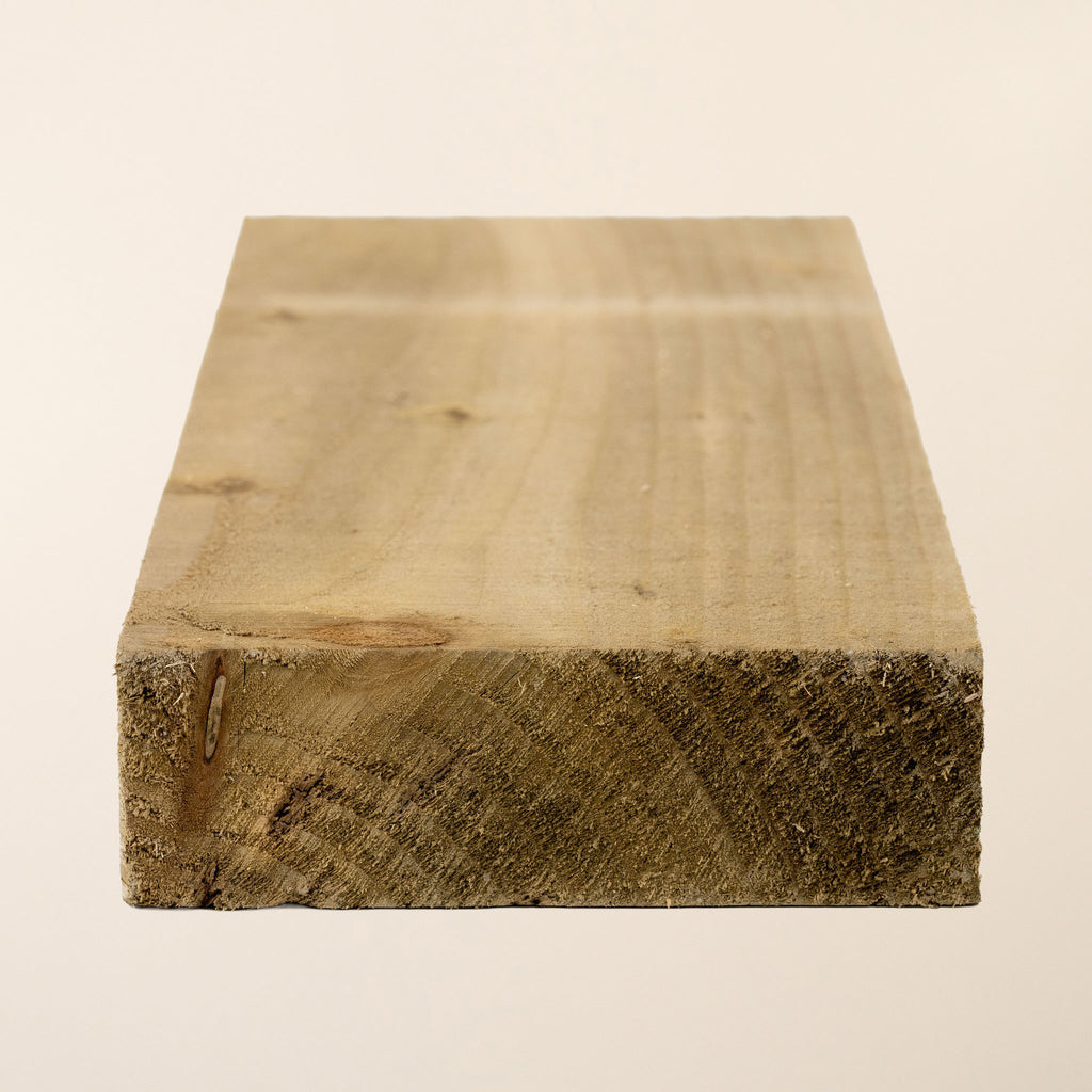 6-inch x 2-inch (150mm x 47mm) Pressure Treated Timber with rough sawn finish, showing the green tanalith treatment that provides long-lasting protection against rot and fungal decay 