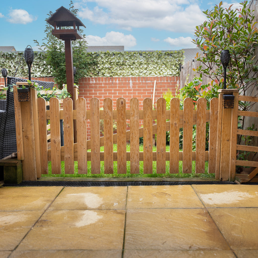 Lifestyle shot of picket side gate round top 