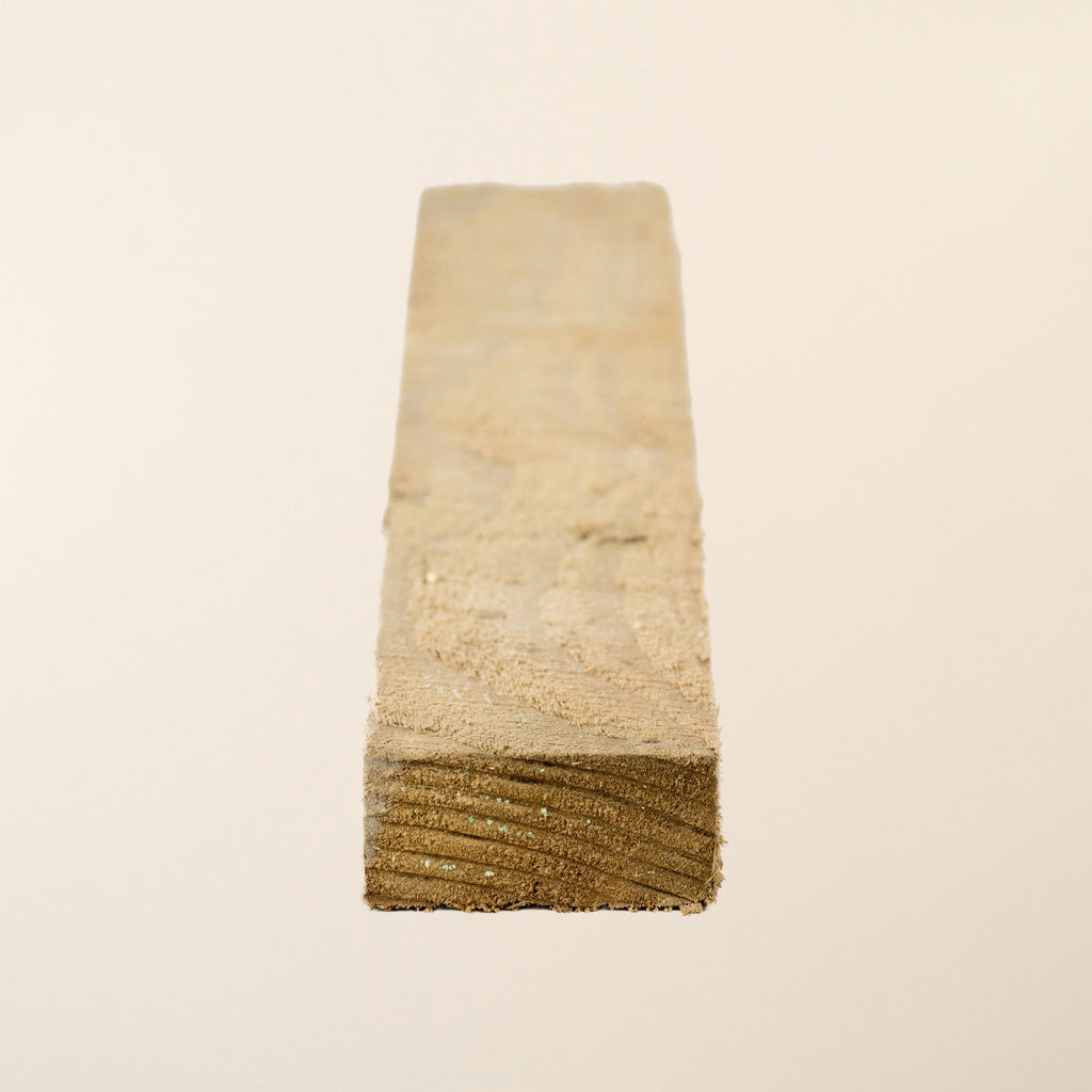 Full-length view of 2x1 pressure treated timber board 