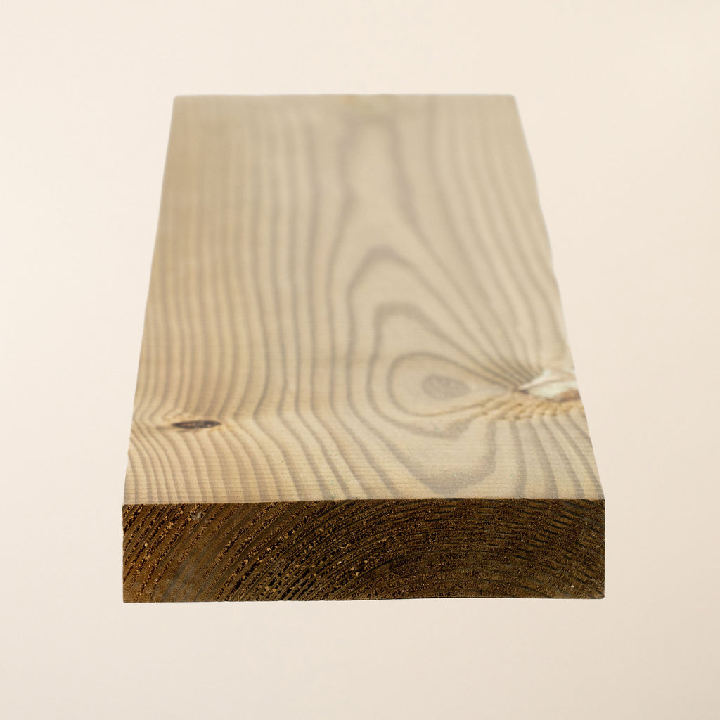 4" x 1" Treated Planed Square Edge timber showing 95mm x 19mm finished dimensions with smooth planed surface and green tanalith pressure treatment 