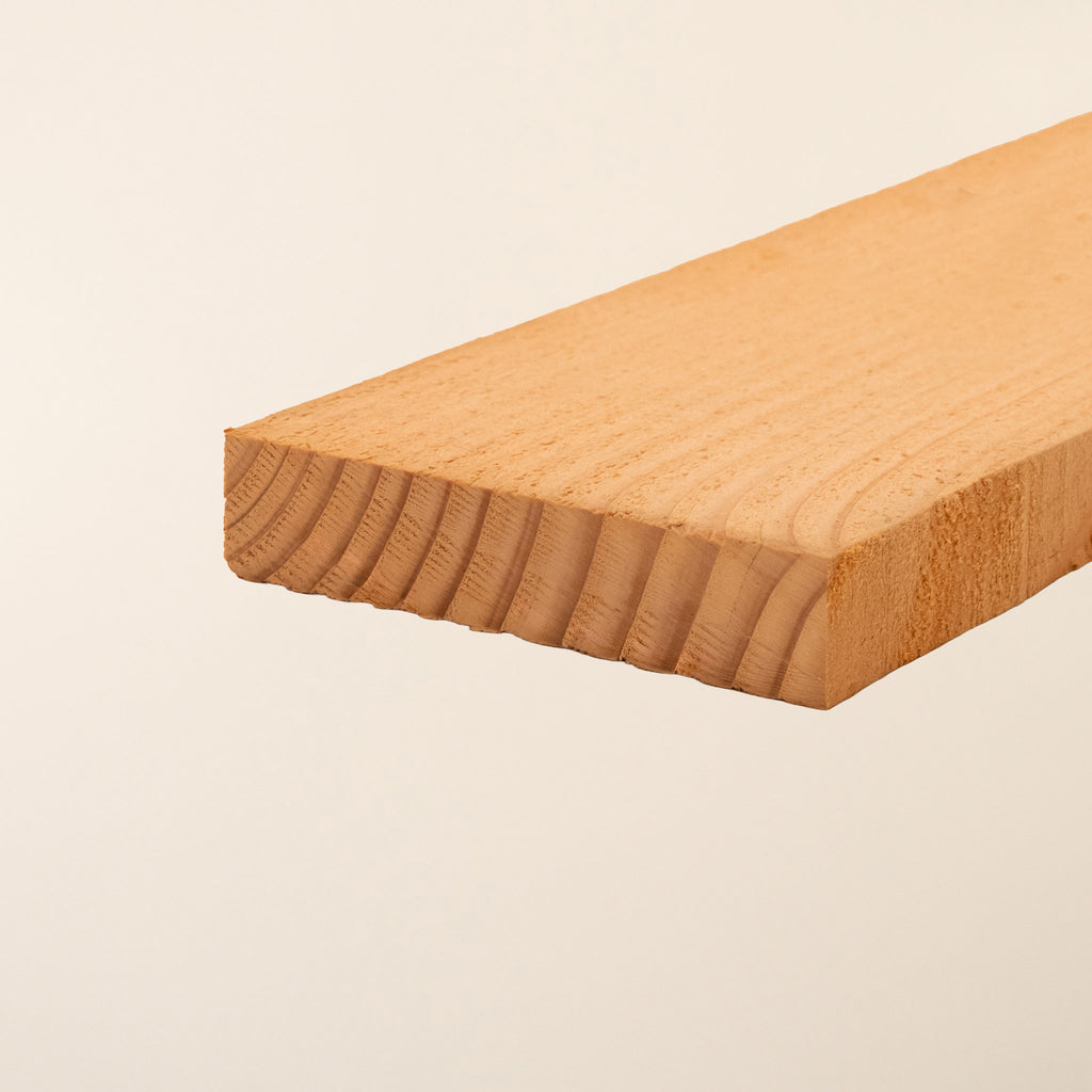 Rough sawn homegrown Larch timber boards measuring 4 inches by 1 inch (100mm x 19mm), displaying natural reddish-brown color with distinctive grain pattern and knots characteristic of British-sourced Larch, ideal for rustic cladding and outdoor projects 