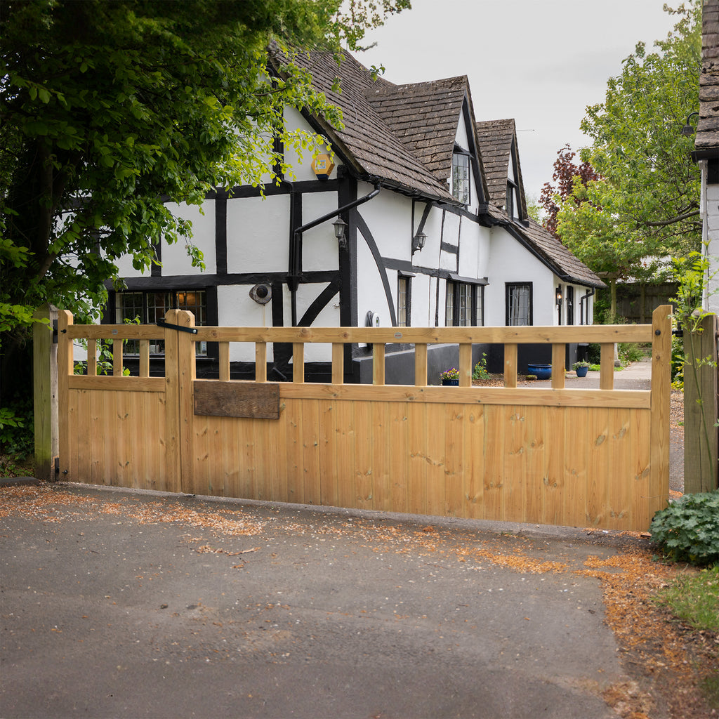 Cottage Entrance Gate pair installed at property entrance, demonstrating practical application and aesthetic appeal 