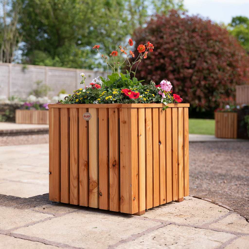 Premium Larch Slatted Panel Planter - Vertical in garden 
