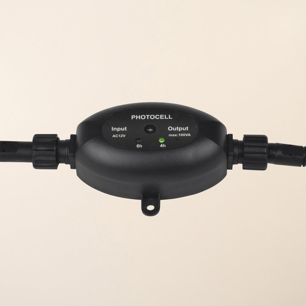 Ellumiere Automatic Light Sensor - Front view of compact photocell device 