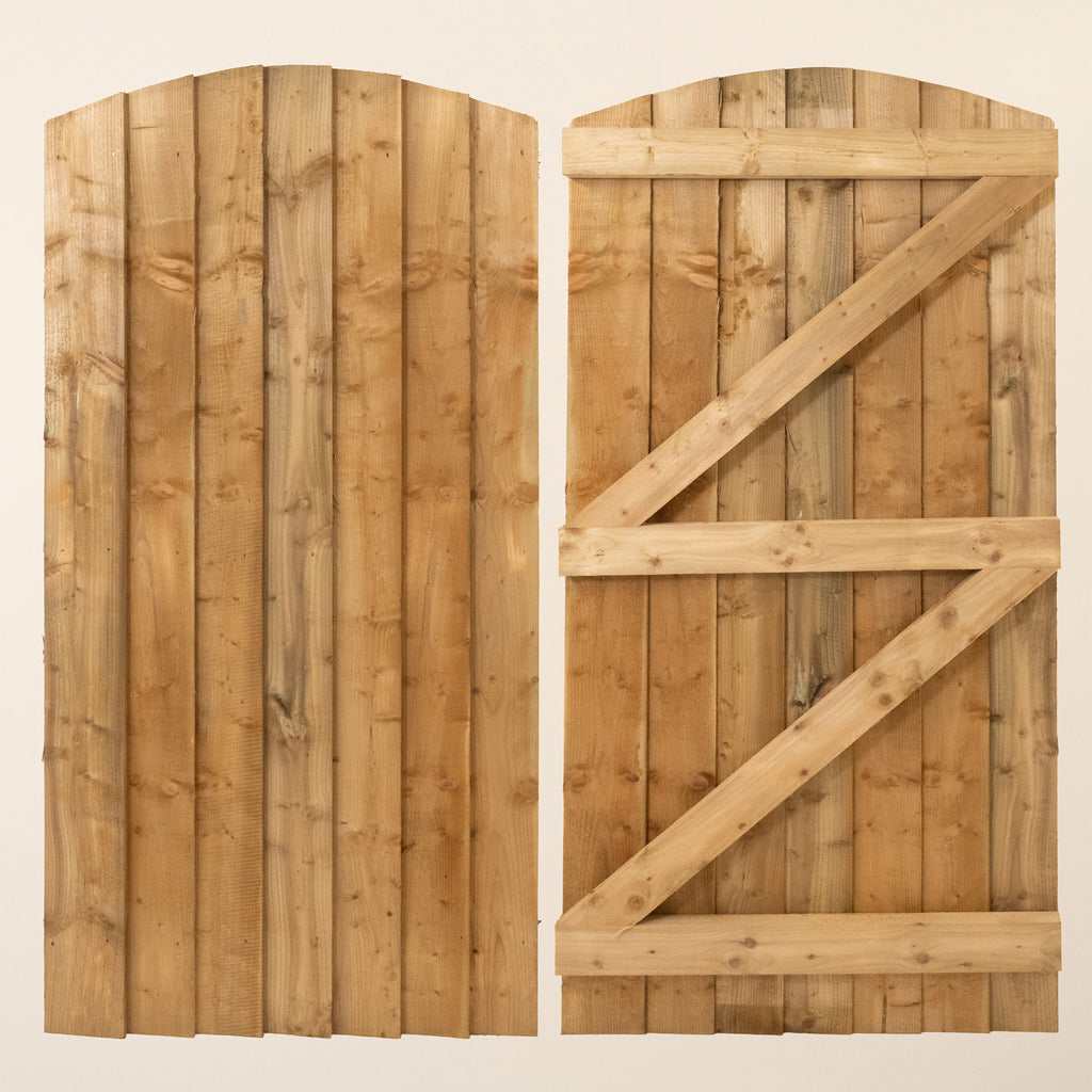 Topsham Curved Featheredge Side Gate (1.8m high) with natural wooden finish, featuring vertical slats and curved top design 
