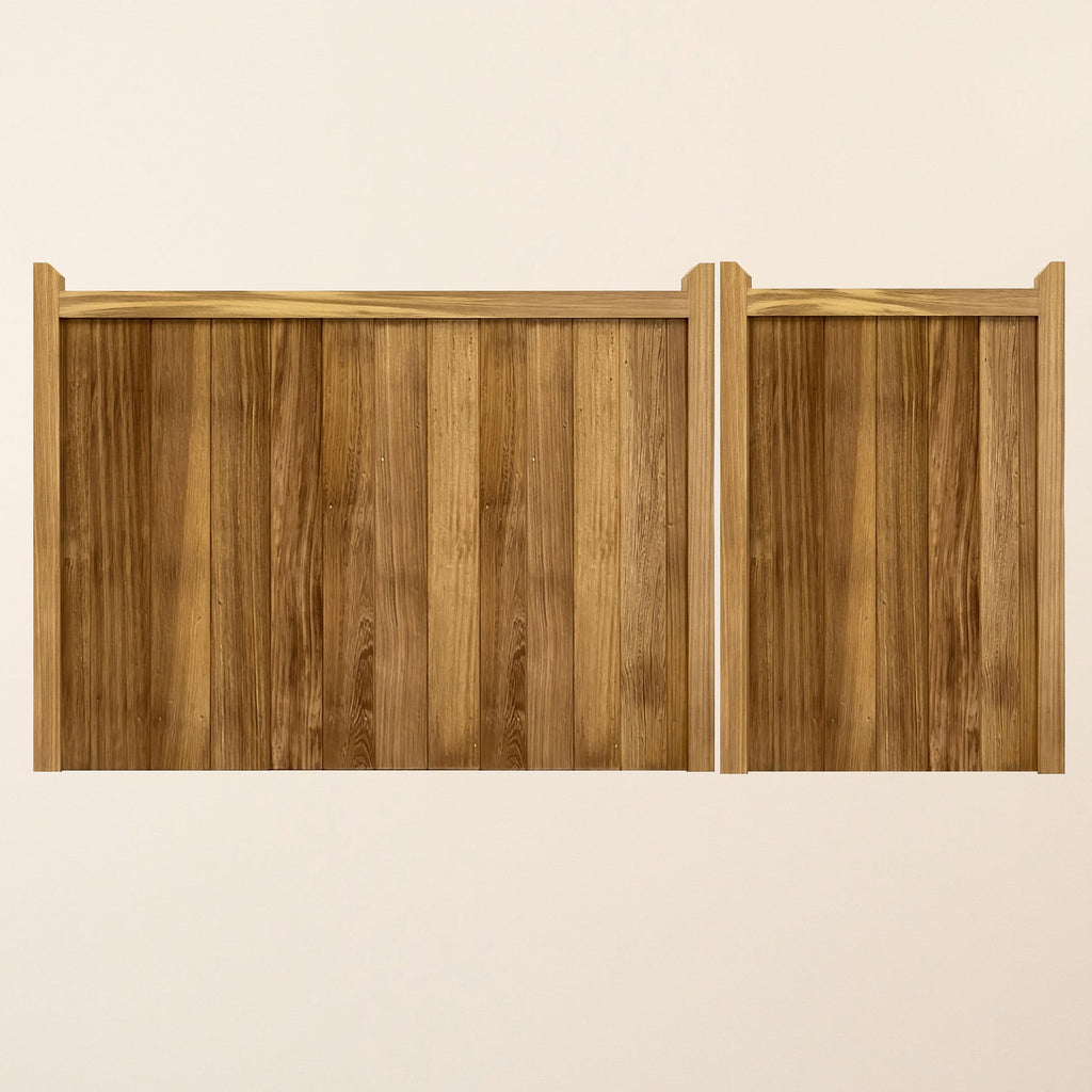 Front view of Iroko Highampton Mortise & Tenon Entrance Gates showing the distinctive 3/4 and 1/4 width pair design with premium African hardwood construction and vertical tongue and groove panels 