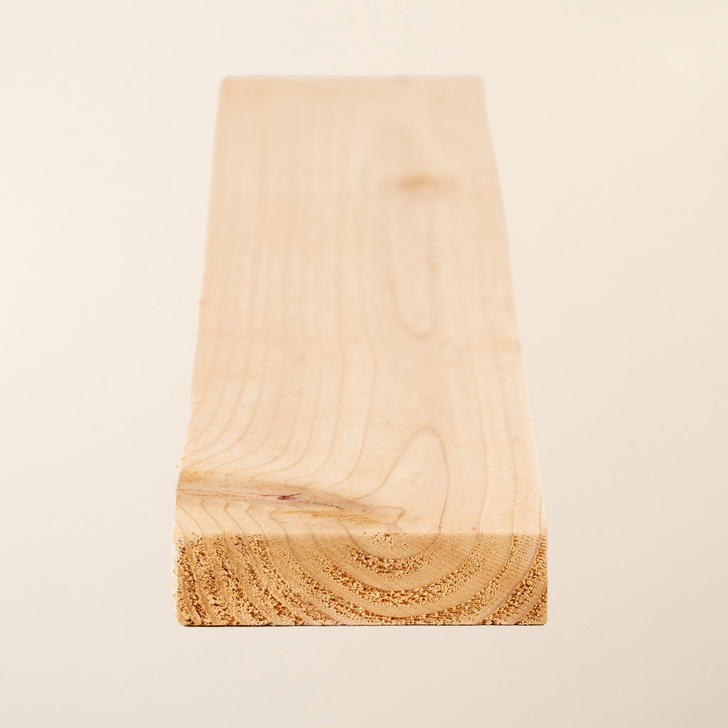 British-grown cedar board with planed 70mm x 19mm dimensions showing smooth finish and characteristic reddish-brown color with natural grain variation 