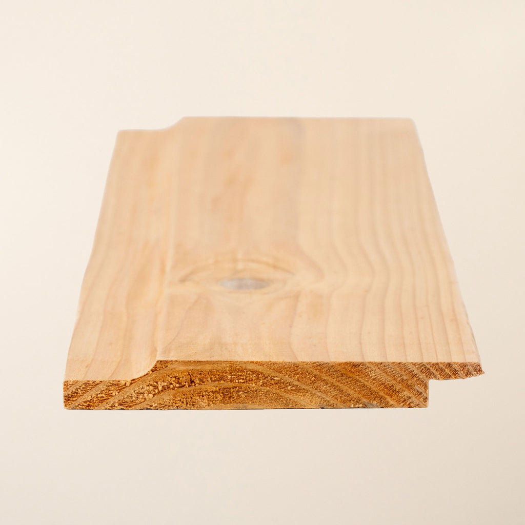 British Cedar Shiplap cladding boards measuring 145mm x 19mm, displaying the distinctive overlapping profile and natural wood grain 