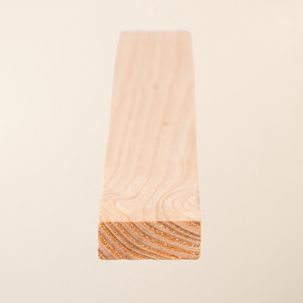 Full-length view of 2" x 1" British Larch board showing 45mm x 19mm planed dimensions with smooth finish and natural honey-gold color characteristic of sustainable home-grown larch 