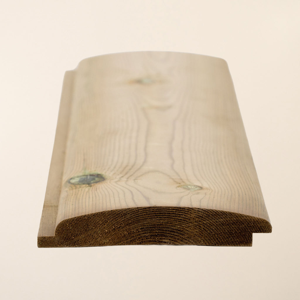 Loglap Treated Redwood timber boards measuring 119mm x 21mm, displaying the distinctive curved profile that resembles traditional log cabin construction 