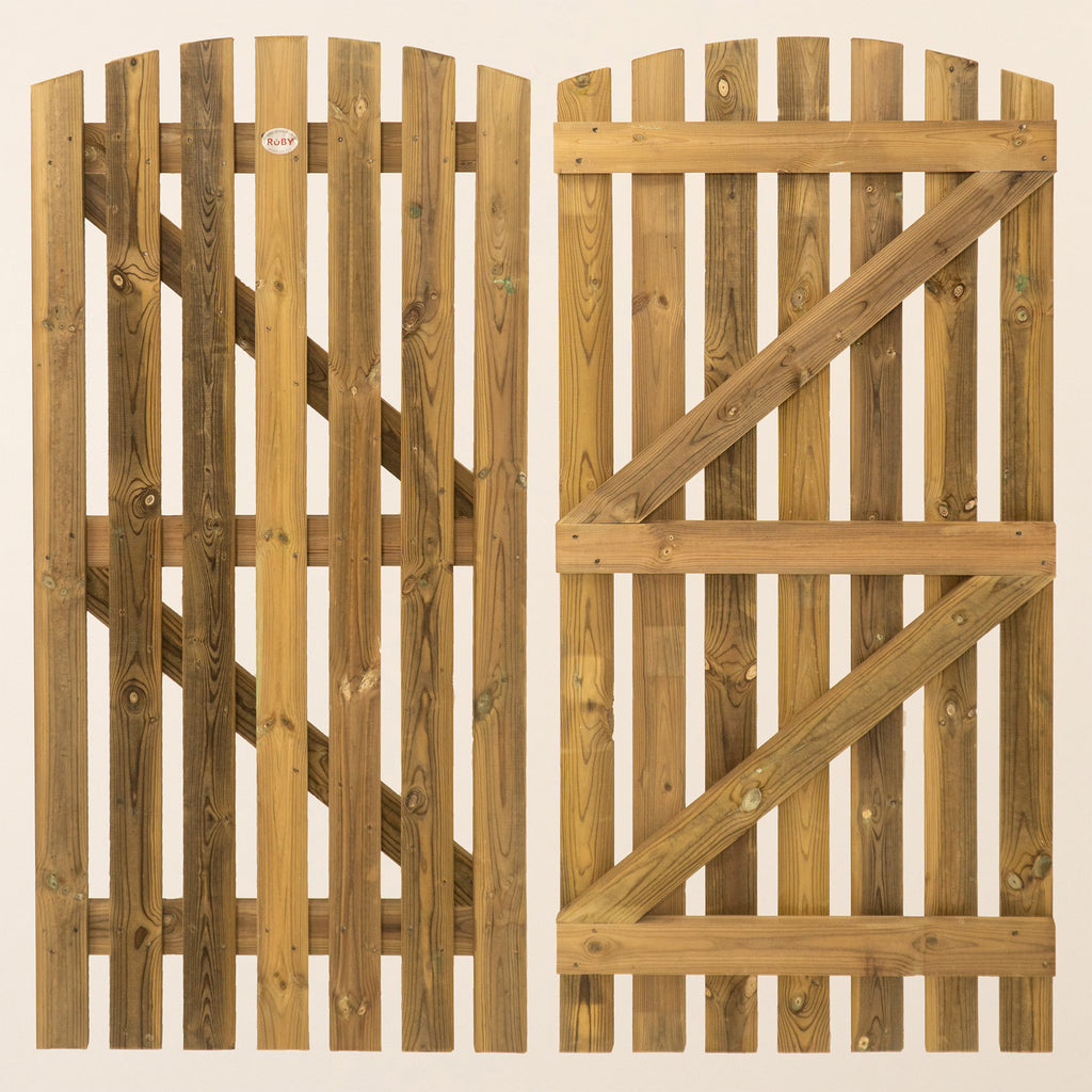 Pair of Premium Curved Top Picket Gates installed as entrance gates, showing the elegant arched design at 1.8m height with evenly spaced vertical pickets 