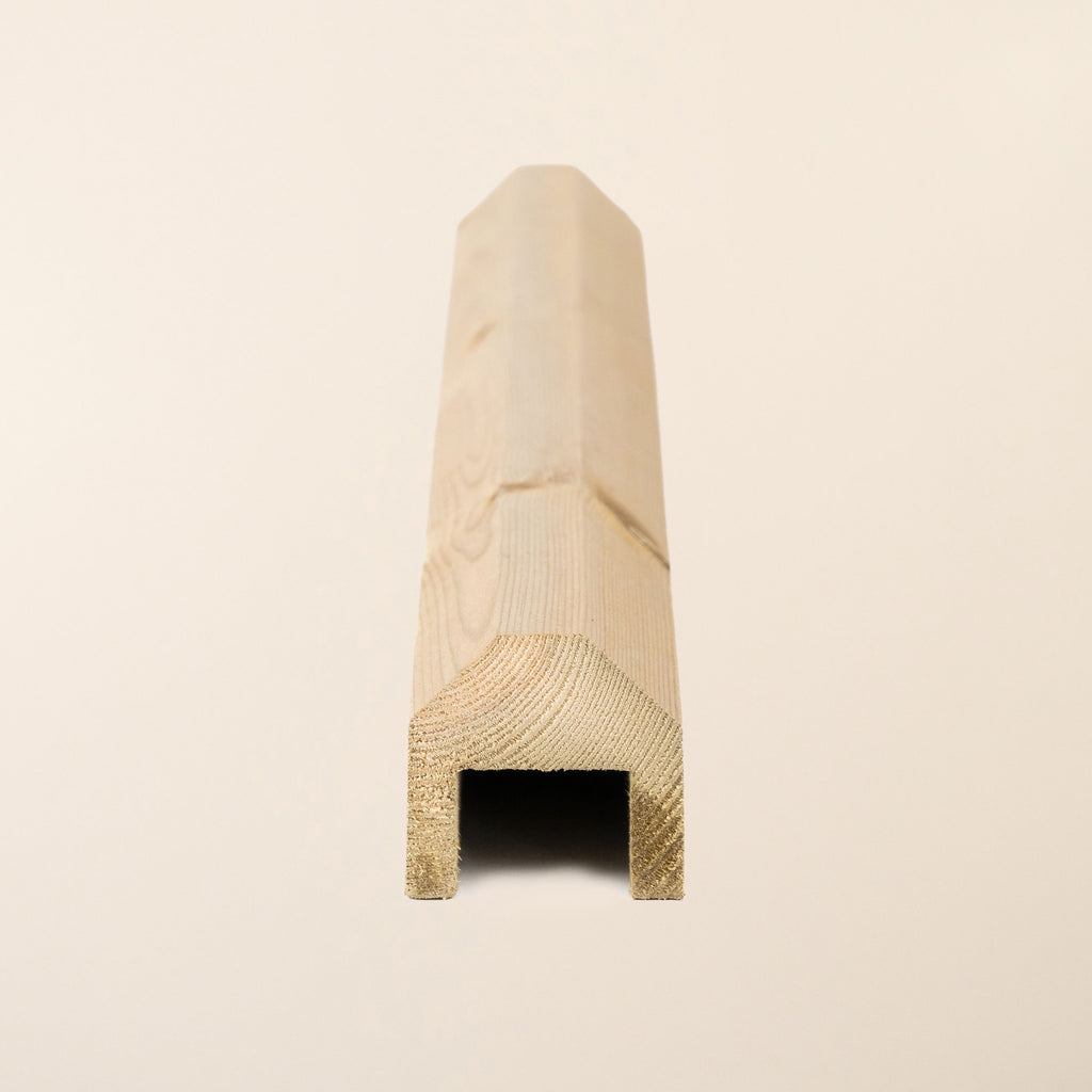 Close-up of Rebated Fence Capping Rail showing 45mm x 45mm planed Scandinavian redwood with green pressure treatment 