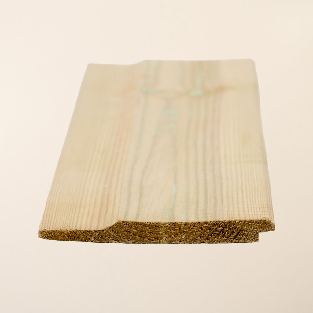 Shiplap Treated Redwood timber boards measuring 119mm x 12mm, showing smooth planed surface and characteristic profile 