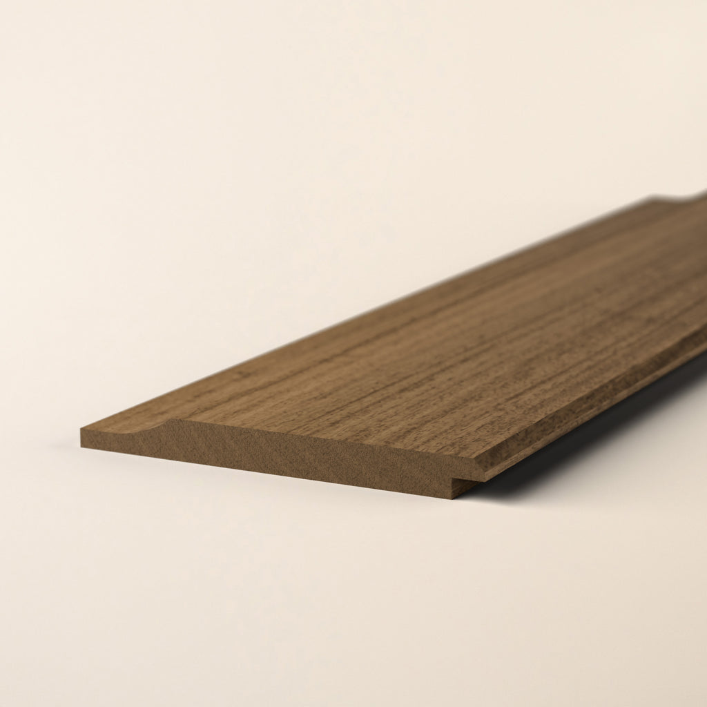 Iroko Shadow Gap cladding boards showing golden-brown color 