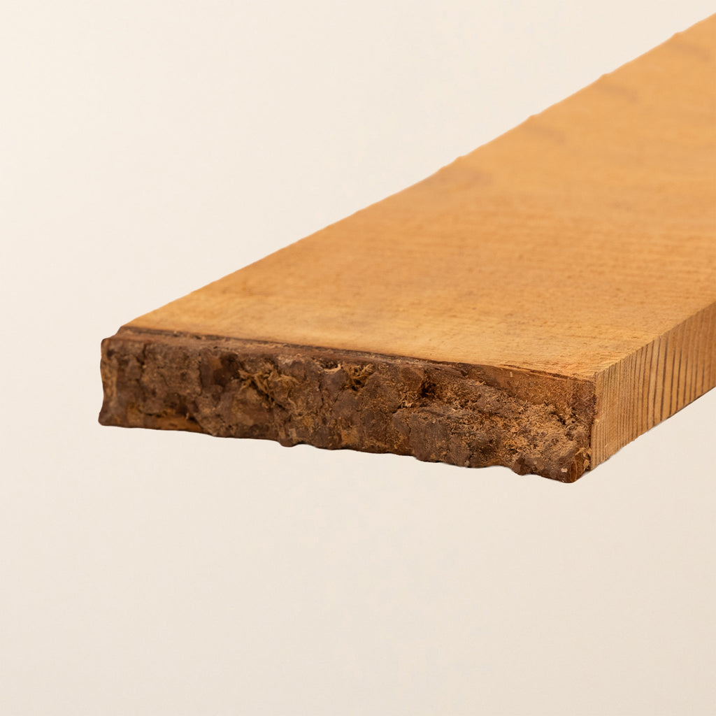 Angled shot of Waney Edge - Larch Cladding - 150mm x 22mm 